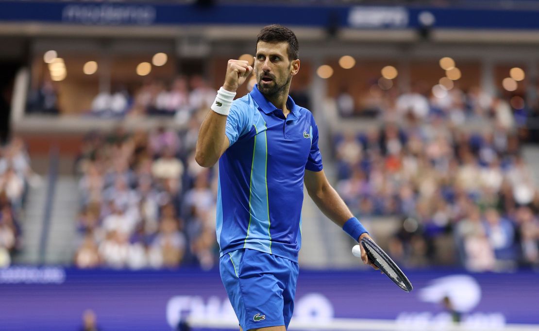 Djokovic celebrates a point against Medvedev.