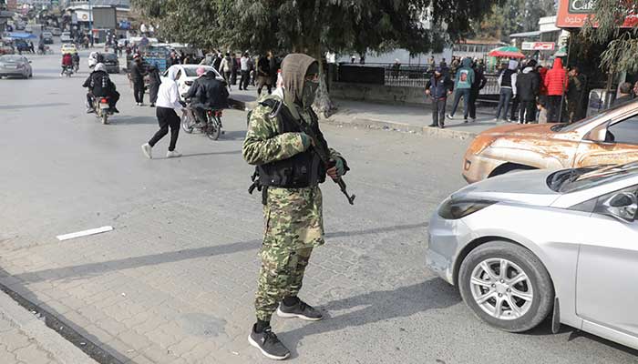 A rebel fighter holds a weapon, after rebels led by HTS have sought to capitalise on their swift takeover of Aleppo in the north and Hama in west-central Syria by pressing onwards to Homs, in Hama, Syria, December 6, 2024. — Reuters