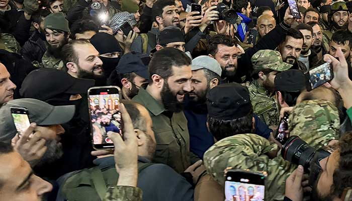 Top rebel commander Abu Mohammed al-Golani greets the crowd at Ummayad Mosque in Damascus, after Syrian rebels announced that they have ousted President Bashar al-Assad, Syria December 8, 2024. — Reuters