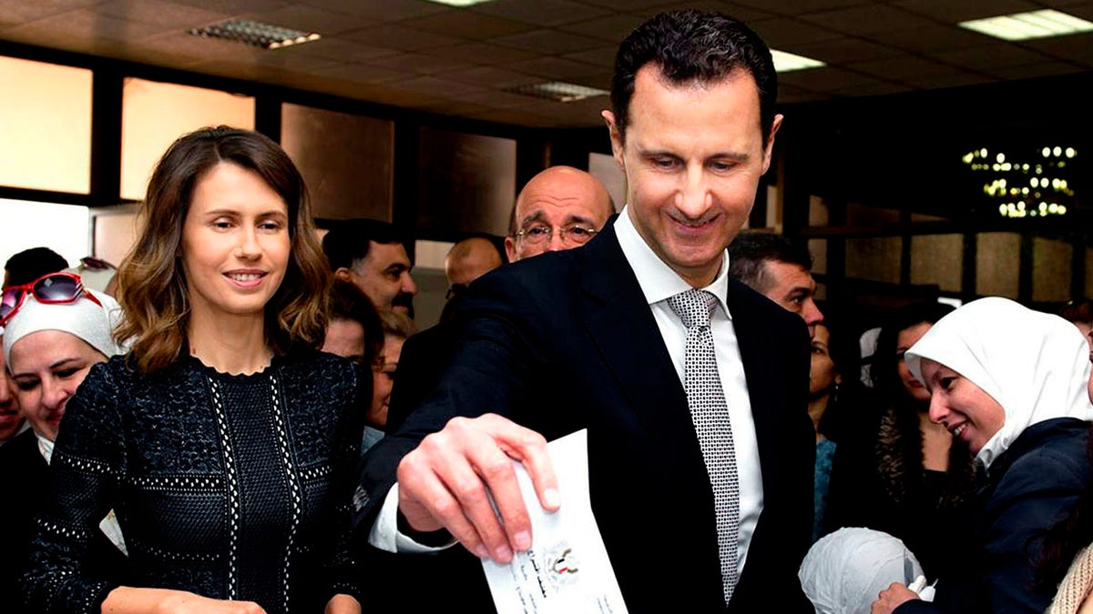 Bashar al-Assad casting a ballot