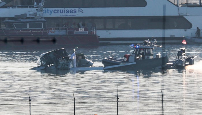 Emergency response units search the crash site of the American Airlines plane on the Potomac River after the plane crashed on approach to Reagan National Airport on January 30, 2025 in Arlington, Virginia. — AFP