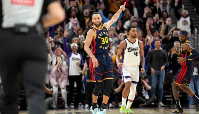 Stephen Curry #30 of the Golden State Warriors reacts after making his 4000th career three-pointer against the Sacramento Kings during the third quarter at Chase Center on March 13, 2025 in San Francisco, California, US. — AFP