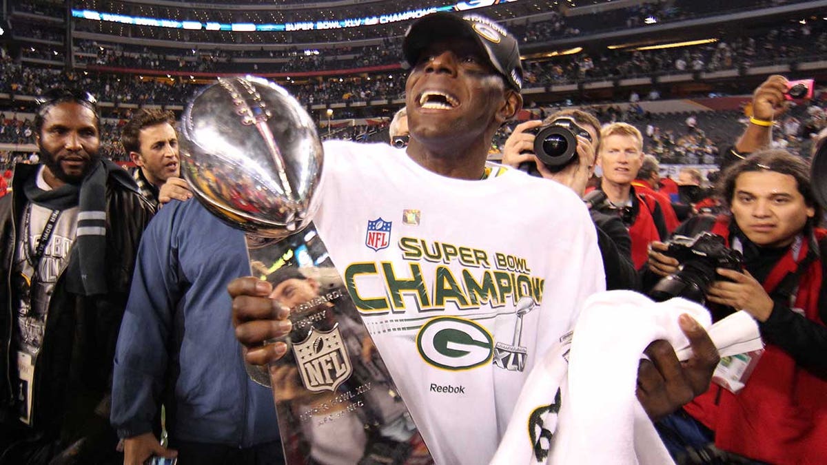 Donald Driver holds the Super Bowl trophy